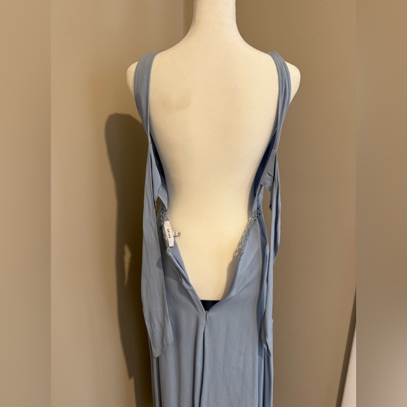 Reiss stunning blue dress size 4 never worn
Open back with tie - Picture 16 of 16